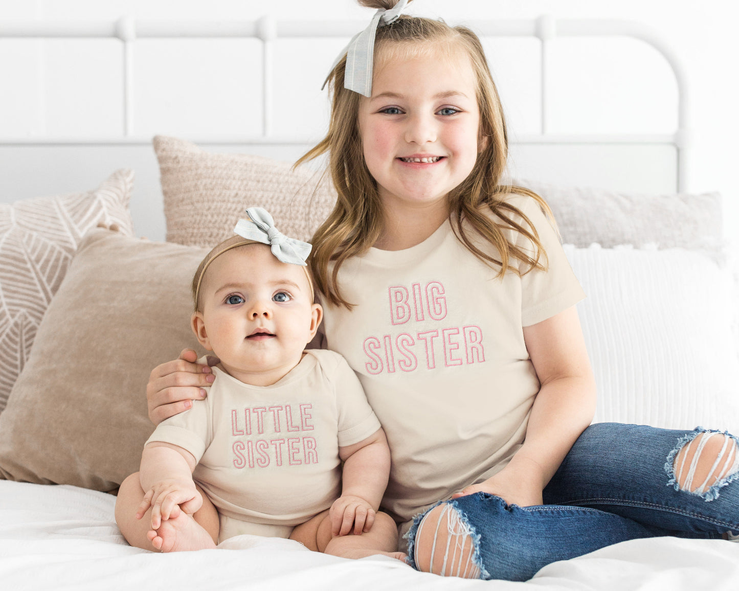 Celebrate sibling love with these adorable cream embroidered sibling shirts and bodysuits, perfect for family photos, pregnancy announcements, and everyday wear! Each piece is made from soft, high-quality cotton and comes in your choice of baby bodysuit, baby bubble romper, toddler t-shirt, or youth t-shirt.