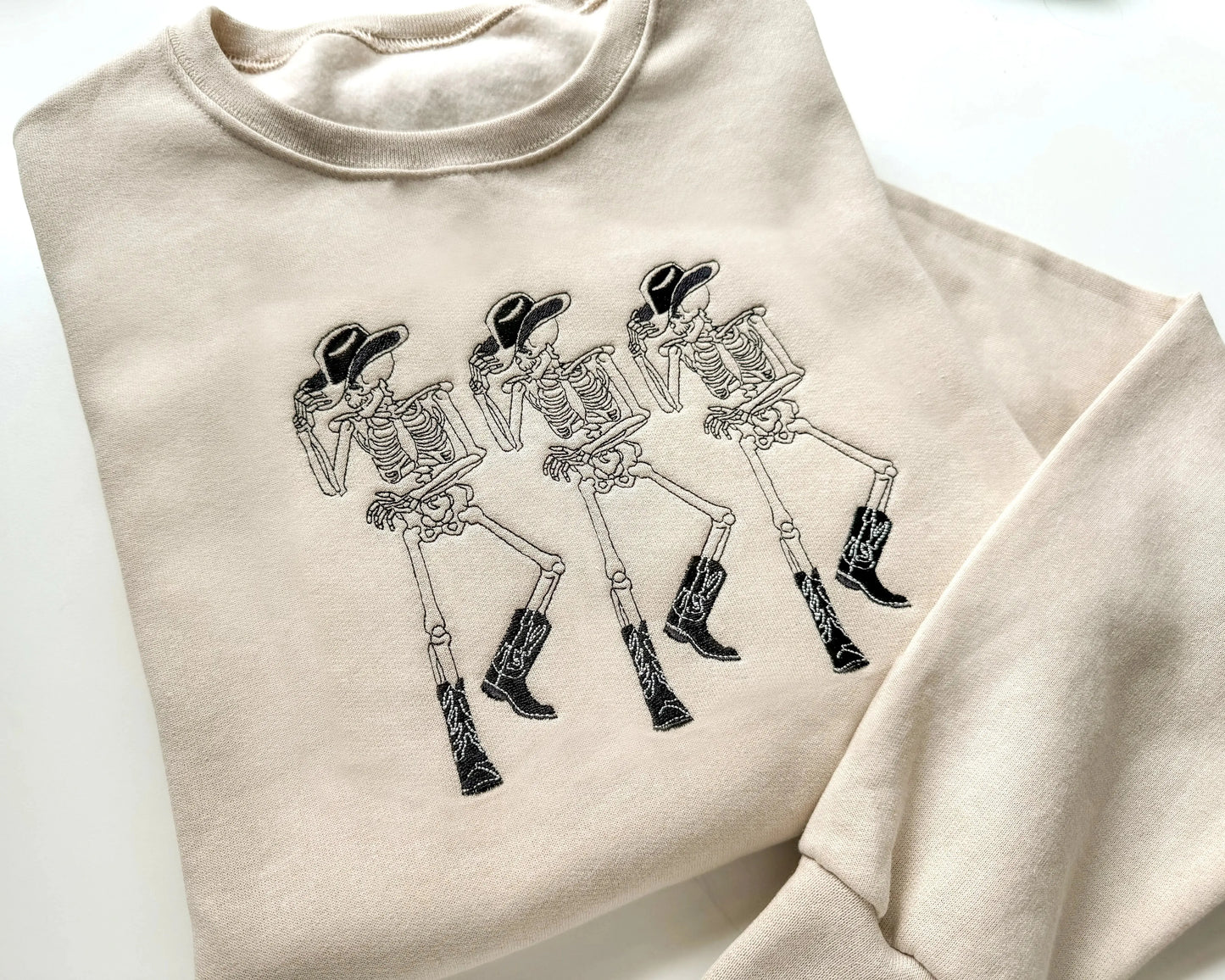 embroidered cowboy skeleton funny halloween sweatshirt halloween crewneck in sand