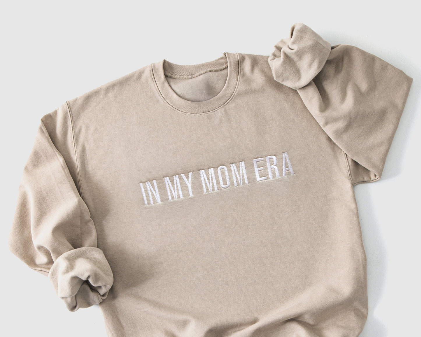 taylor swift in my mom era in my baby era matching baby onesies and sweatshirts crewneck pullover hoodie neutral beige white embroidered embroidery newborn baby shower gift new mom mommy and me mama and mini family matching outfits