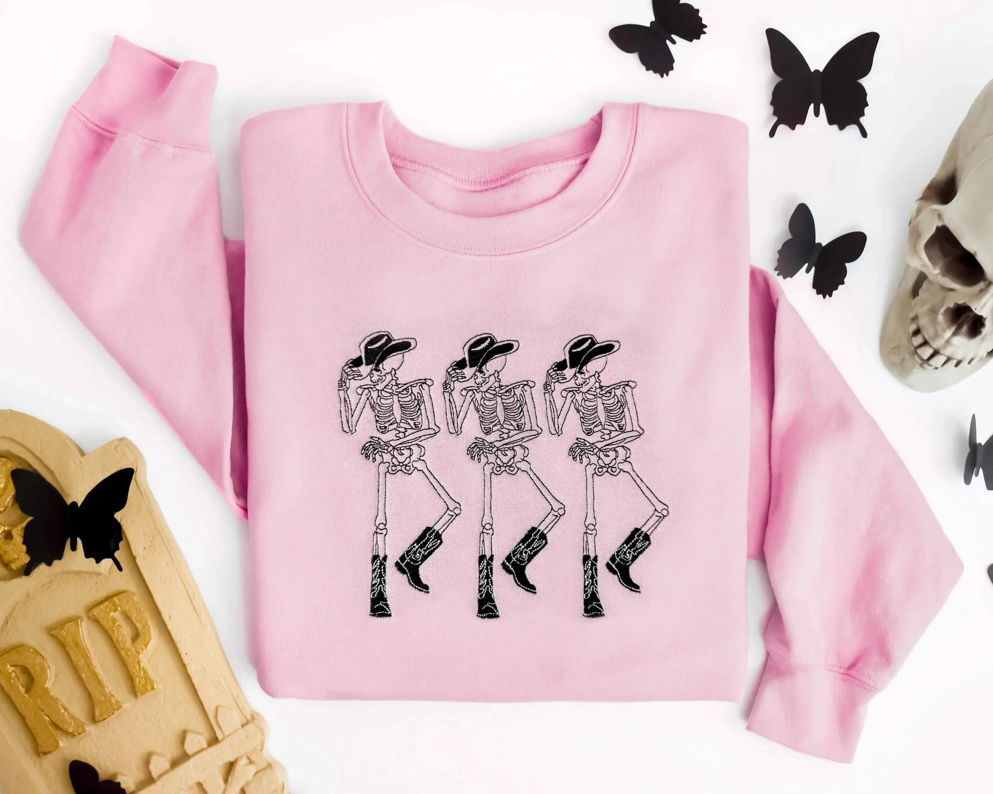 embroidered cowboy skeleton funny halloween sweatshirt halloween crewneck in pink 