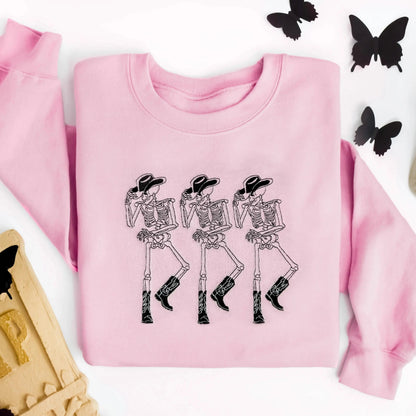 embroidered cowboy skeleton funny halloween sweatshirt halloween crewneck in pink 