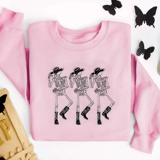 embroidered cowboy skeleton funny halloween sweatshirt halloween crewneck in pink 