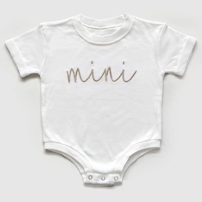 mama and mini neutral matching embroidered t-shirt mom and baby set flat lay of a bubble romper