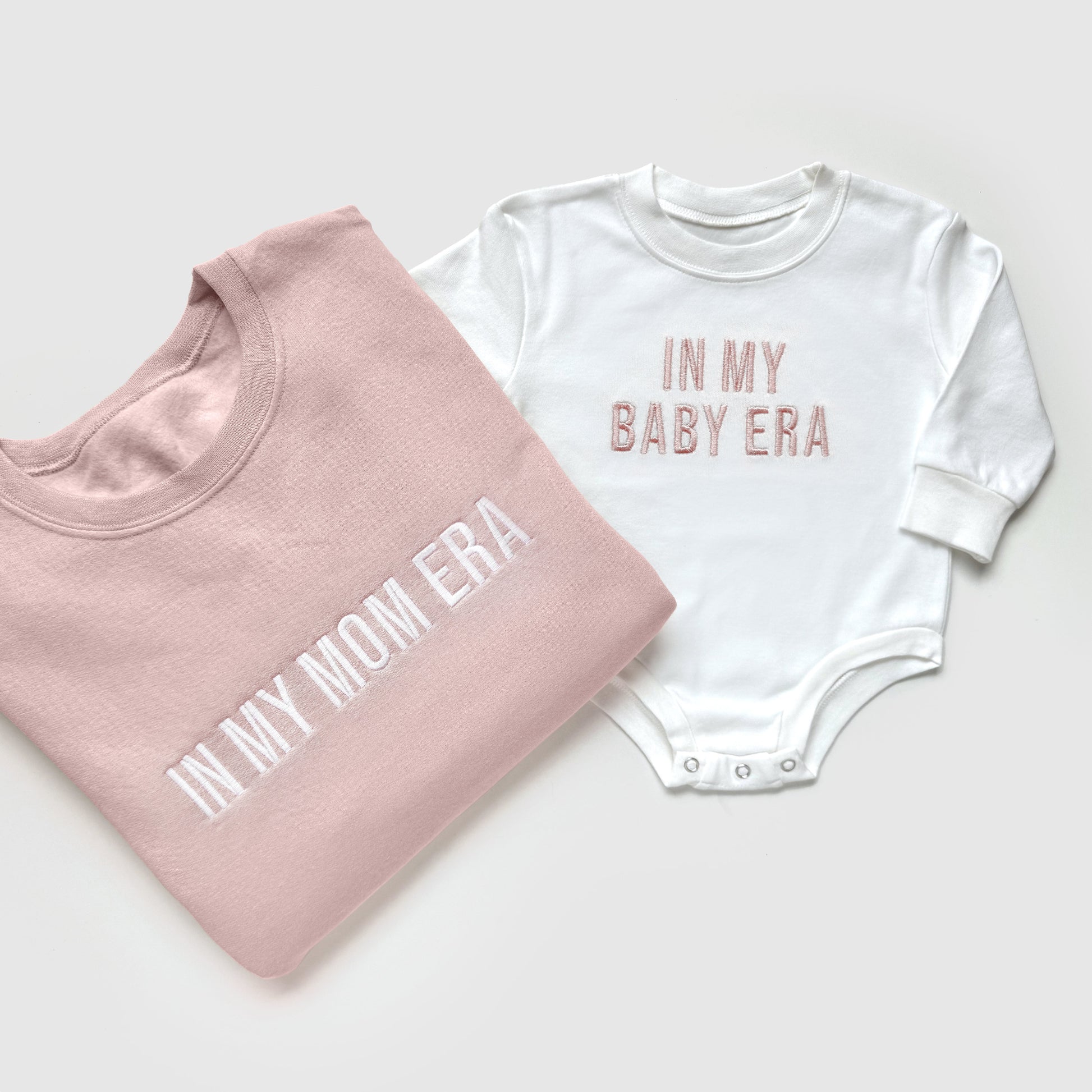 taylor swift in my mom era in my baby era matching baby onesies and sweatshirts crewneck pullover hoodie neutral beige white embroidered embroidery newborn baby shower gift new mom mommy and me mama and mini family matching outfits