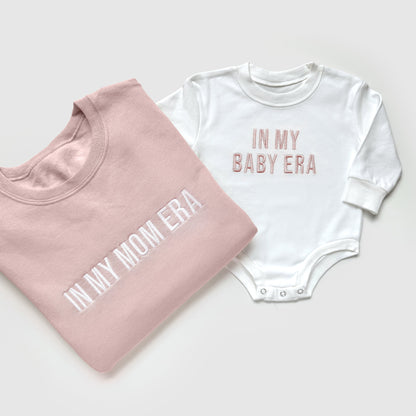 taylor swift in my mom era in my baby era matching baby onesies and sweatshirts crewneck pullover hoodie neutral beige white embroidered embroidery newborn baby shower gift new mom mommy and me mama and mini family matching outfits