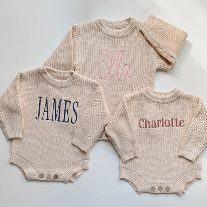 Personalized baby sweater rompers with embroidered names in different font styles